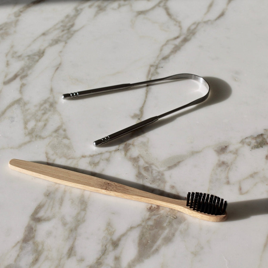 How to remove the bristles from your bamboo toothbrush and compost